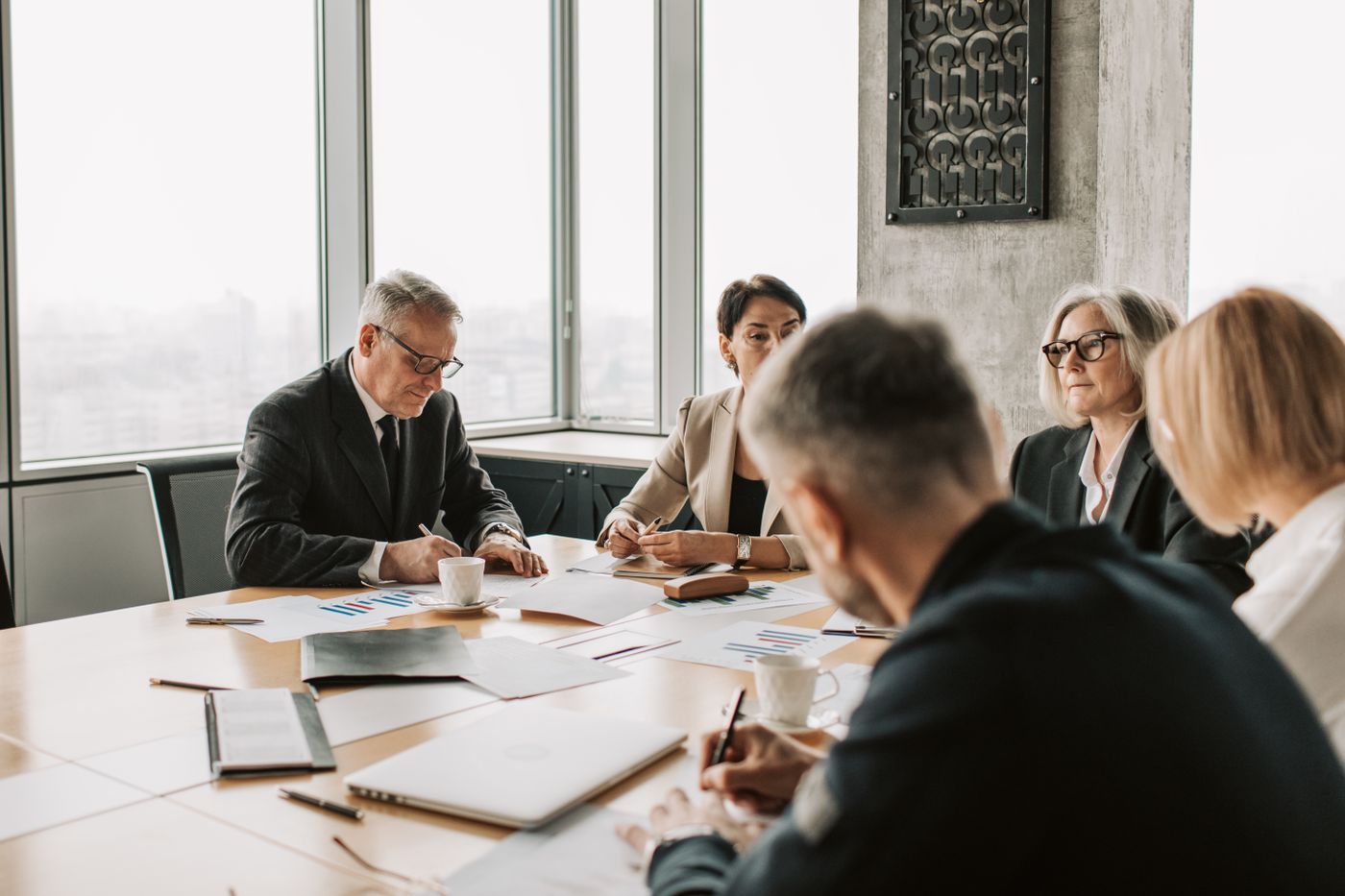 An exclusive boardroom where verified members meet privately